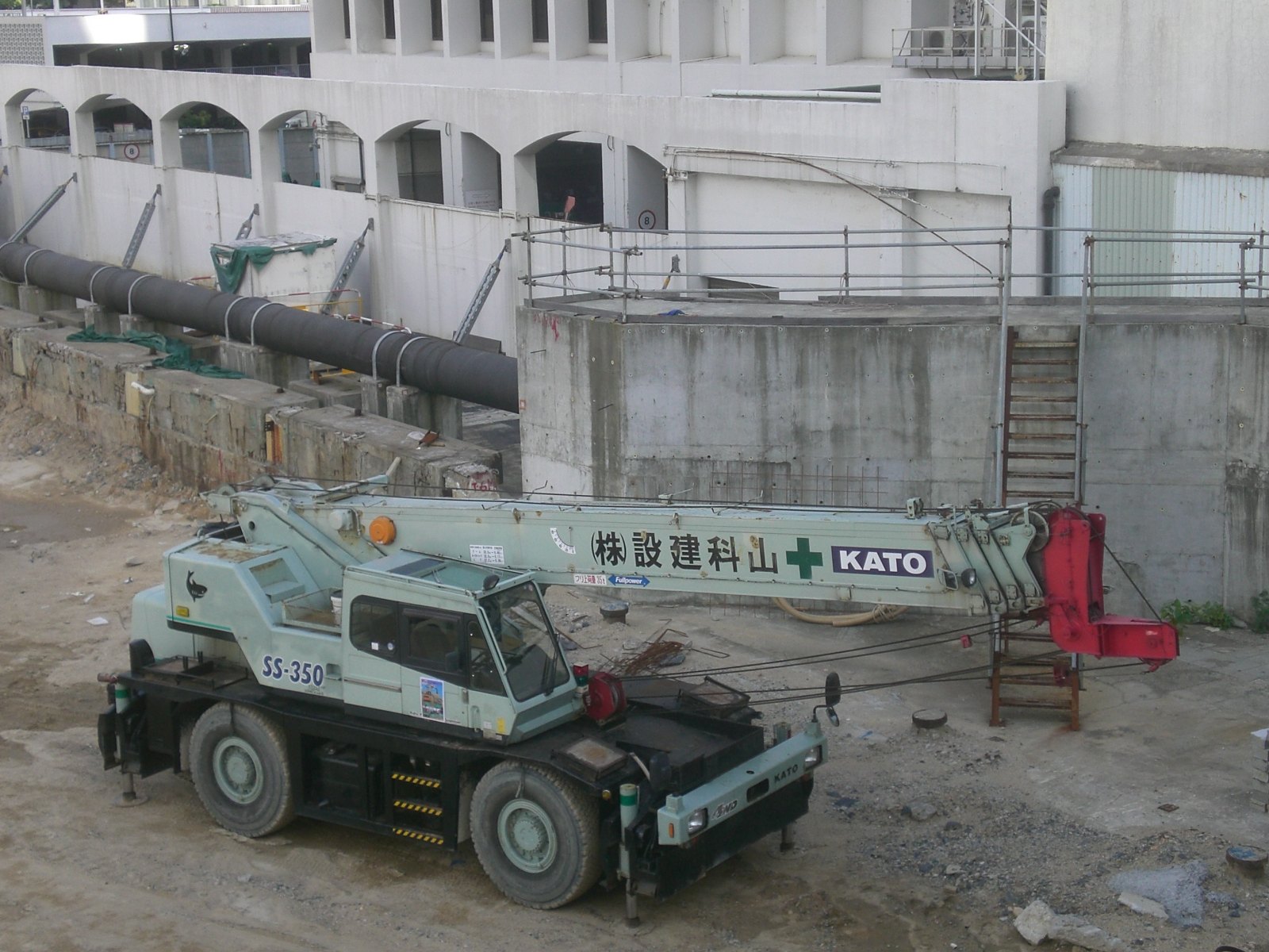Kato rough terrain crane at a work site