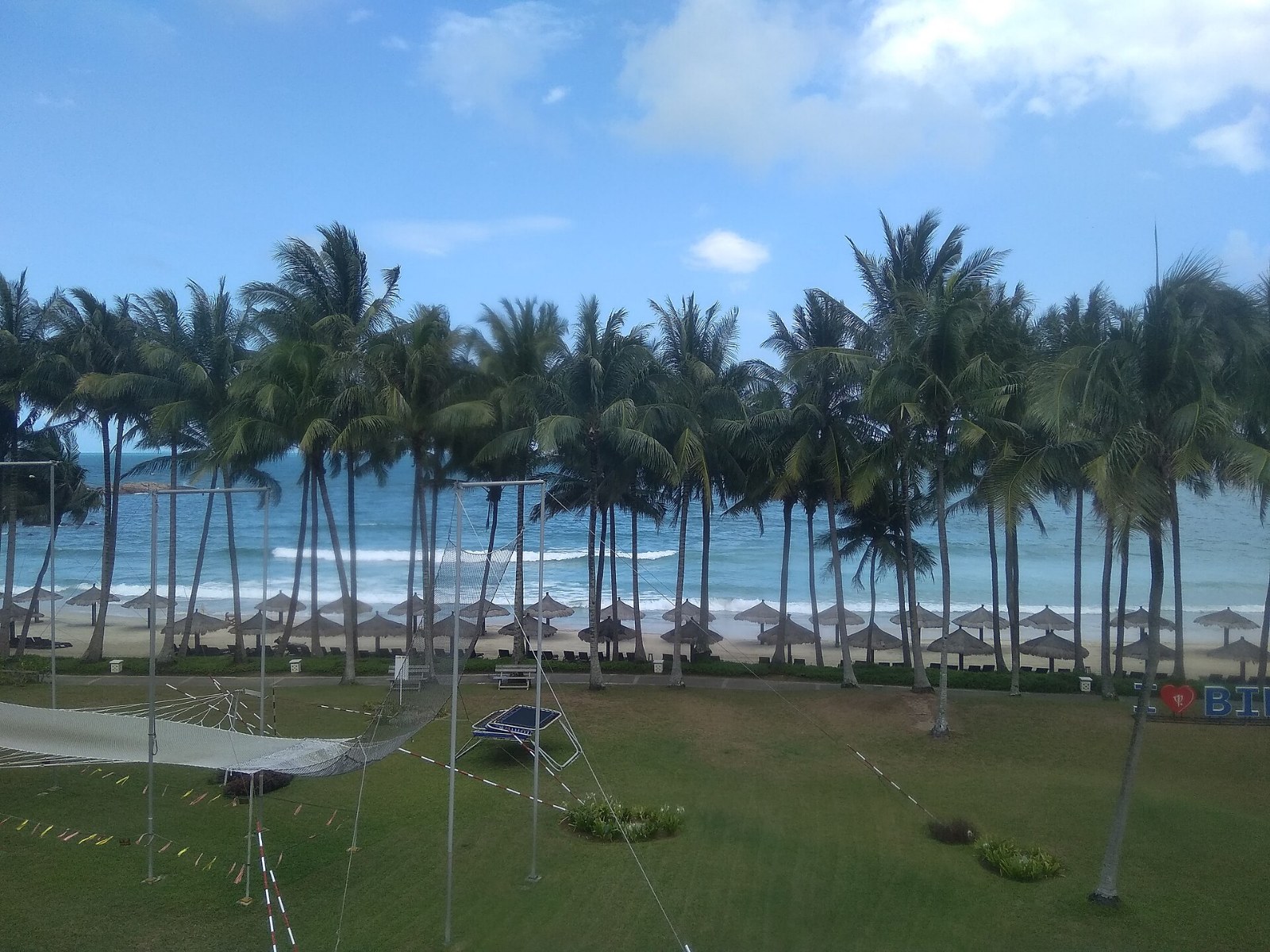 Palm-lined beach on Bintan Island